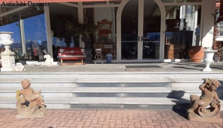 Coppia di putti in pietra